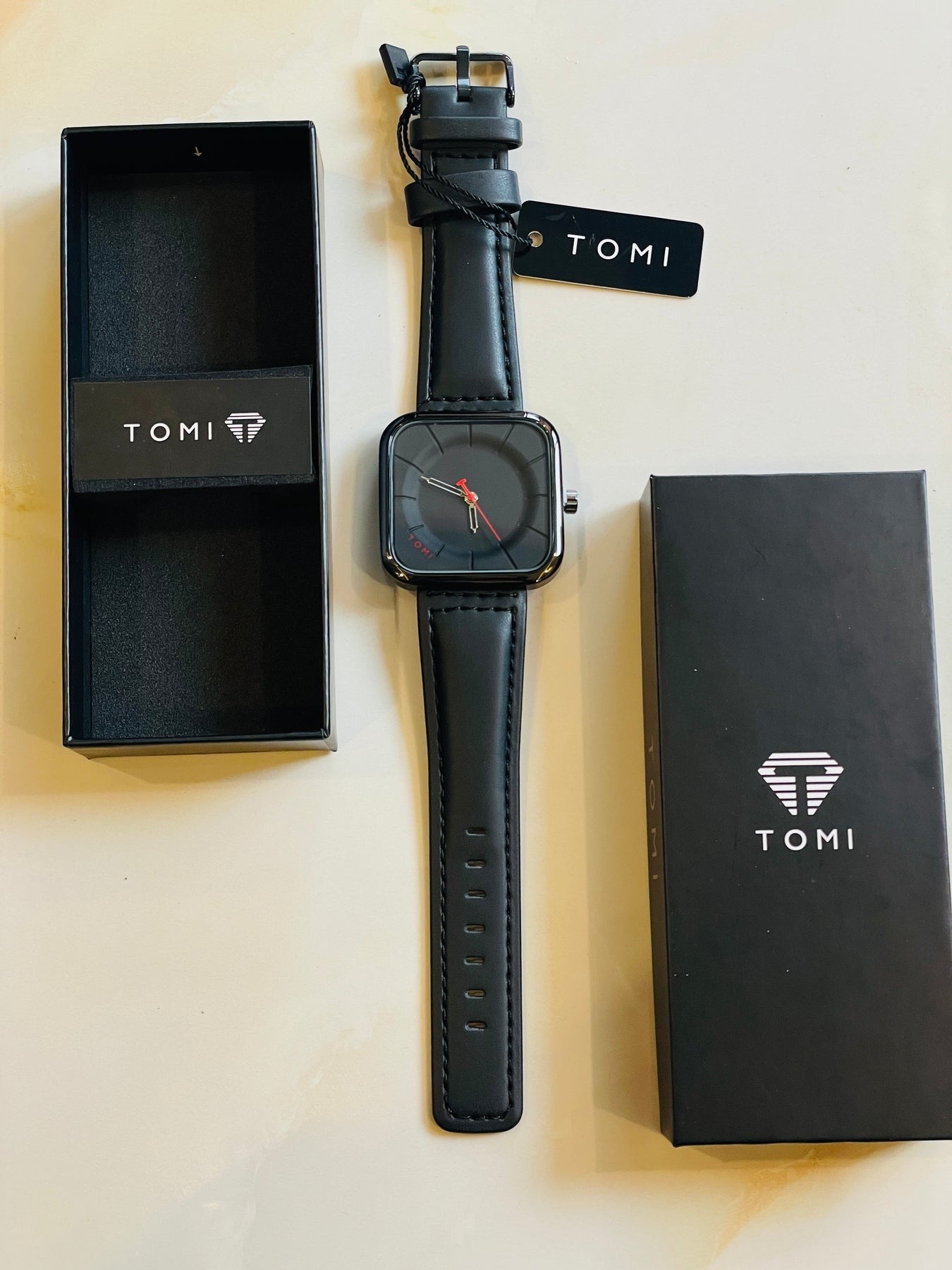 TOMI BLACK STRAP RED NEEDLE